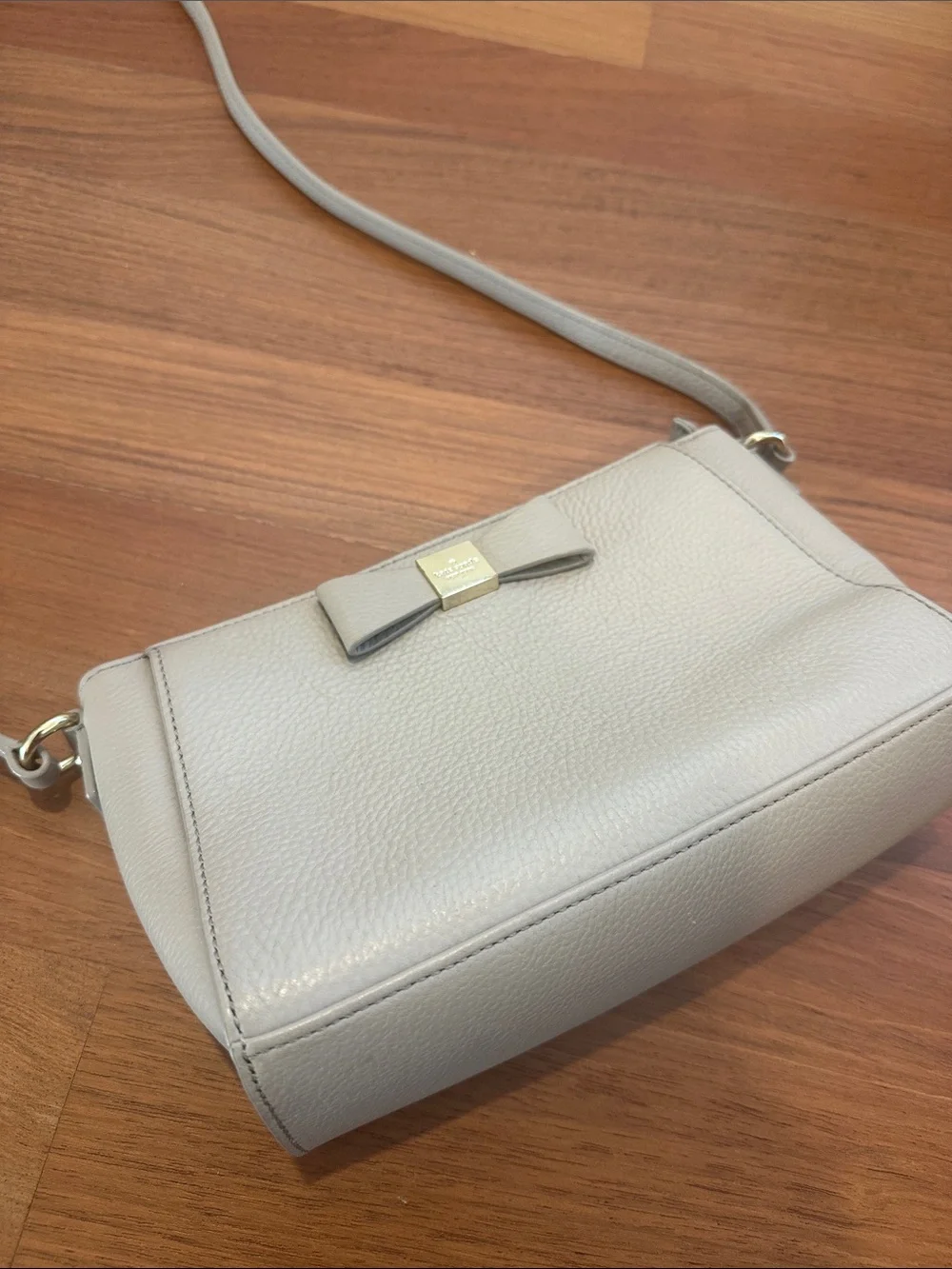 kate spade Pebble Leather Crossbody in Light Gray with Bow Accent